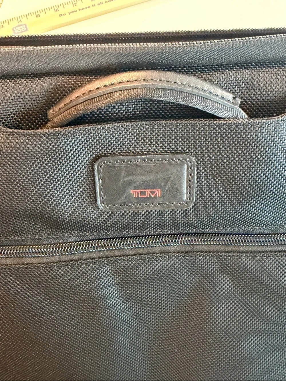Tumi Black Travel Organizer with Red Logo